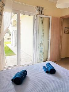 Postel nebo postele na pokoji v ubytování Mango apartment