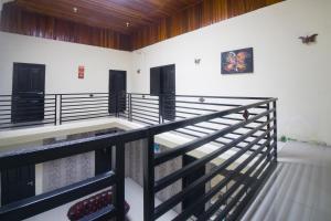 Postel nebo postele na pokoji v ubytování RedDoorz Syariah near RSUD Ainun Habibie Gorontalo