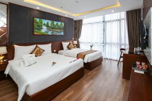Ένα ή περισσότερα κρεβάτια σε δωμάτιο στο Nagila Boutique Hotel