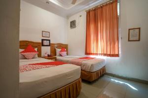 Tempat tidur dalam kamar di SUPER OYO 1173 Hotel Shofa Marwah