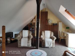 Posezení v ubytování Apartment unterm Dach