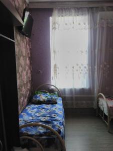 A bed or beds in a room at Vlada