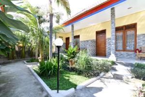 Giardino di RedDoorz Plus @ Singaraja