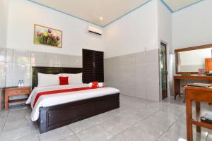 Letto o letti in una camera di RedDoorz Plus @ Singaraja