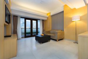 Zona d'estar a Quest Hotel Kuta by ASTON