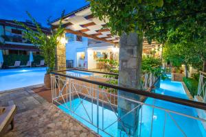 an image of a swimming pool at a villa at Neda Hotel in Olympia