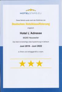 Certifikát, hodnocení, plakát nebo jiný dokument vystavený v ubytování Hotel l'adresse garni