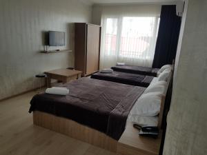 MikePalace客房内的一张或多张床位