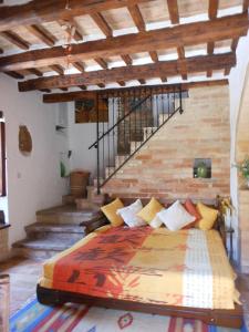 a bedroom with a large bed in a room at Casa Elena sul mare a Torre di Palme in Marina Palmense