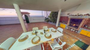 En balkon eller terrasse på Casa del mar