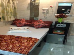 Voodi või voodid majutusasutuse Rich Hostel toas