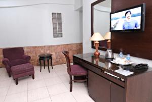 TV o dispositivi per l'intrattenimento presso Hotel Alma