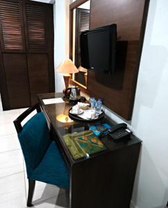 TV o dispositivi per l'intrattenimento presso Hotel Alma