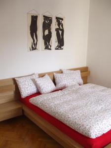 Кровать или кровати в номере Appartement St. Leonhard