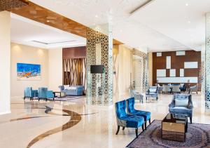 Гостиная зона в Hotel Santika Gresik