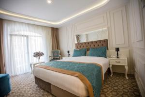 Кровать или кровати в номере Palde Hotel & Spa