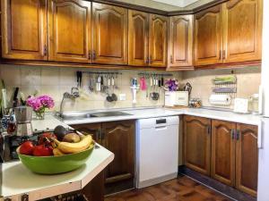 A kitchen or kitchenette at Beachfront oasis in Costa del Sol.