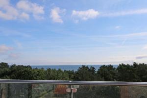 a view of the ocean from a window at Haus Granitz Whg. 5.3 mit Dachterrasse und Sauna in Binz