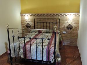 Postel nebo postele na pokoji v ubytování Las Bodegas Del Gilo