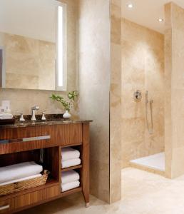
a bathroom with a tub, toilet and sink at Aghadoe Heights Hotel & Spa in Killarney
