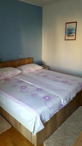 Postel nebo postele na pokoji v ubytování Guesthouse Matušan's place