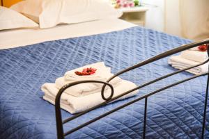 A bed or beds in a room at Dimora del Balì
