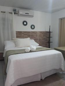 Ένα ή περισσότερα κρεβάτια σε δωμάτιο στο Casa da Albertina
