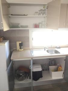 Kuchyň nebo kuchyňský kout v ubytování Penthouse avec vue imprenable sur mer + 8 fotografií