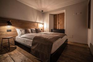 Postel nebo postele na pokoji v ubytování Casa Pasini-Foresteria