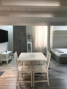 A bed or beds in a room at Giudea Home