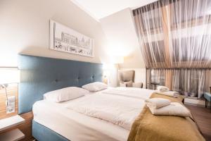 Posteľ alebo postele v izbe v ubytovaní Hotel Perfect