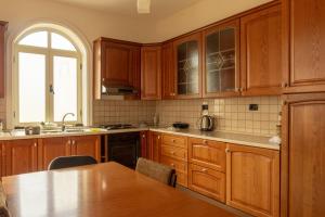 Kuchyň nebo kuchyňský kout v ubytování Luckyshine hostel