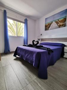 Posteľ alebo postele v izbe v ubytovaní Sun and Relax (San valentin)