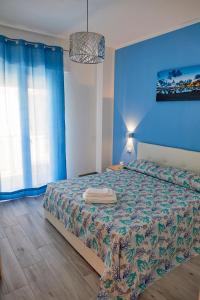 Posteľ alebo postele v izbe v ubytovaní Costa del Golfo