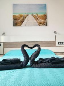 Posteľ alebo postele v izbe v ubytovaní Sun and Relax (San valentin)