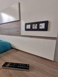 Televízia a/alebo spoločenská miestnosť v ubytovaní Sun and Relax (San valentin)
