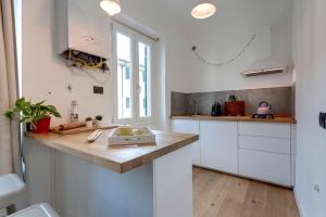 Kuchyňa alebo kuchynka v ubytovaní Scala Apartment by Mamo Florence + 6 fotografií