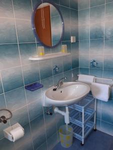 Koupelna v ubytování Apartments Renata