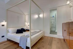 Posteľ alebo postele v izbe v ubytovaní Scala Apartment by Mamo Florence