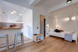 Posteľ alebo postele v izbe v ubytovaní Scala Apartment by Mamo Florence