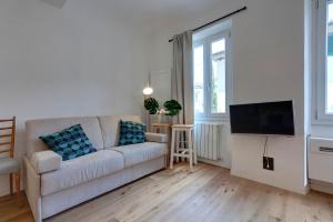 Televízia a/alebo spoločenská miestnosť v ubytovaní Scala Apartment by Mamo Florence