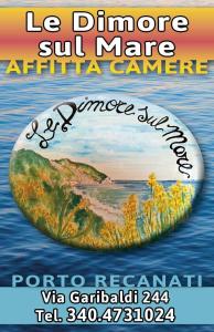 Un volante para un concierto con una pintura de una pequeña isla en el agua en Le dimore sul mare en Porto Recanati
