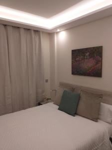 Postel nebo postele na pokoji v ubytování Apartamentos Vacacionales Joctis, 1º A