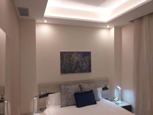 Łóżko lub łóżka w pokoju w obiekcie Apartamentos Vacacionales Joctis, Bajo A