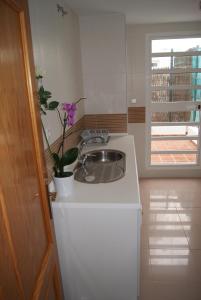 Kuchyňa alebo kuchynka v ubytovaní Costa Ballena Cómodo Bajo con Piscina, Patio y 3 Dormitorios Parking free + 24 fotografií