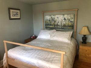 
A bed or beds in a room at 1000 Islands B&B "Boutique Hotel Experience"
