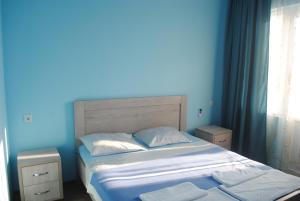 Letto o letti in una camera di David Guest House
