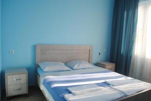 Letto o letti in una camera di David Guest House
