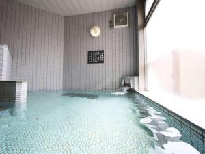 The swimming pool at or close to Green Rich Hotel Aso Kumamoto Airport (Artificial hot spring Futamata Yunohana)