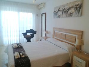 Ліжко або ліжка в номері Calpe - 2 bedroom 2 bathroom townhouse - Residencial Cala Manzanera